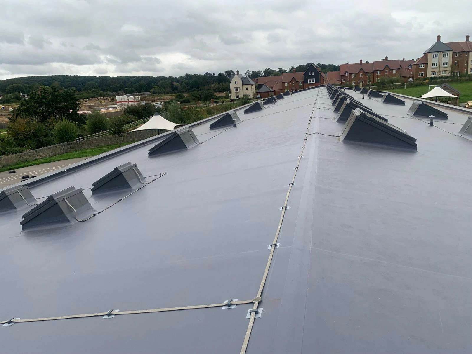 Installation of new flat roof with roof lights for a commercial client.